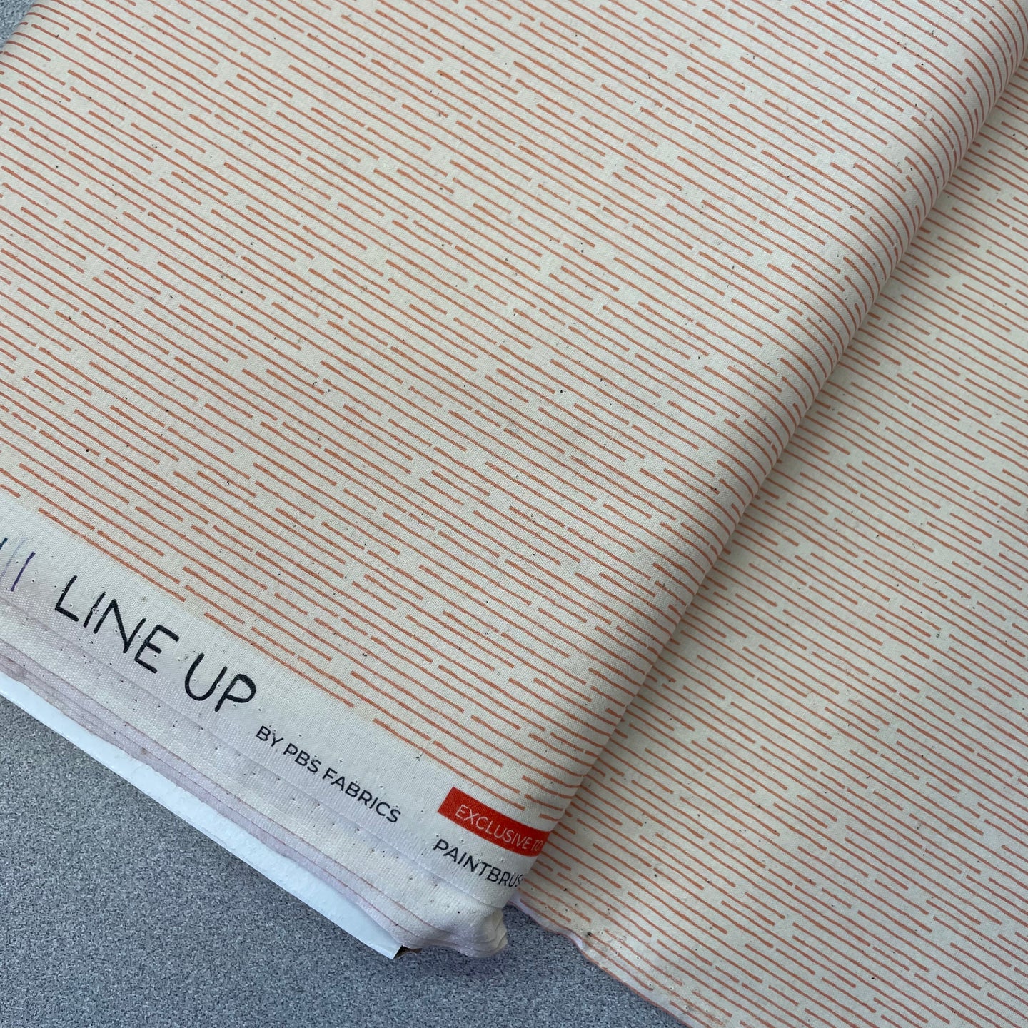 Line Up, Dark Rust on Cream, 38023376 for Paintbrush Studio, sold by the half-yard