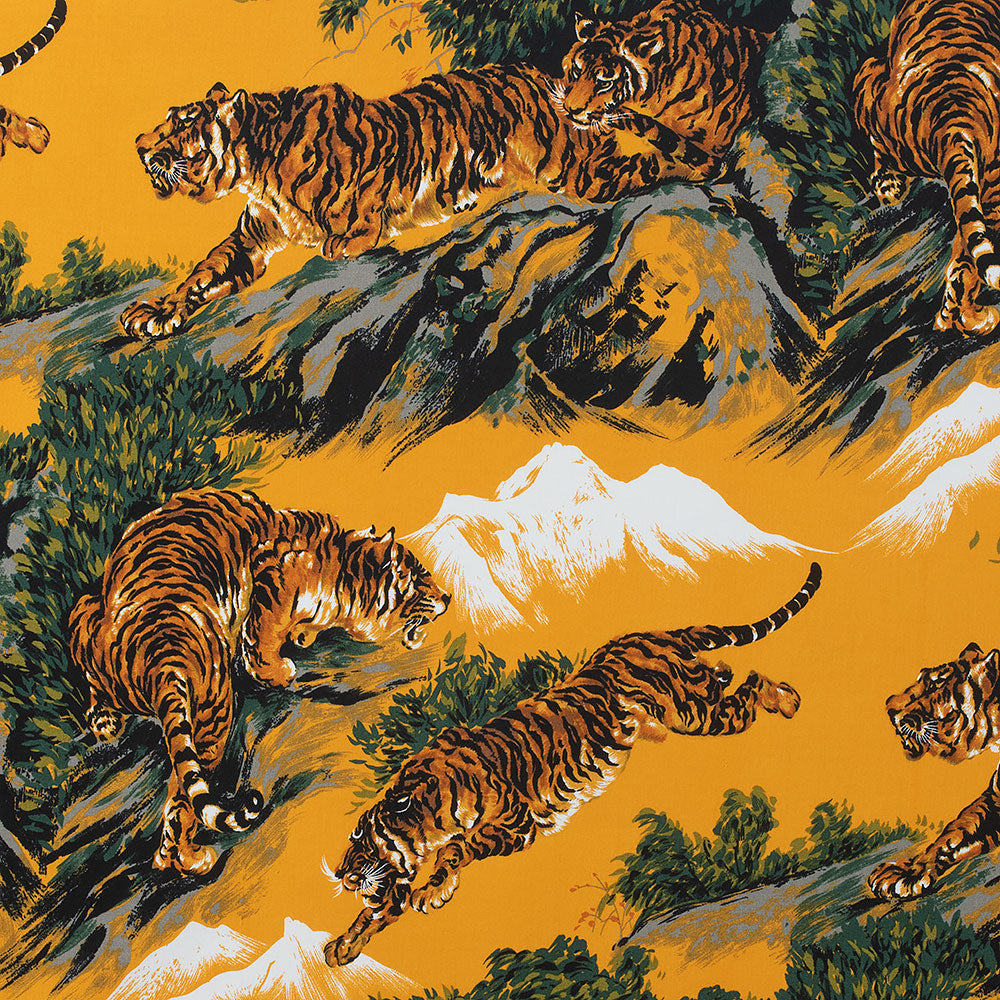 Tora, Tiger in Gold,  by the DeLeon Design Group for Alexander Henry, sold by the half-yard