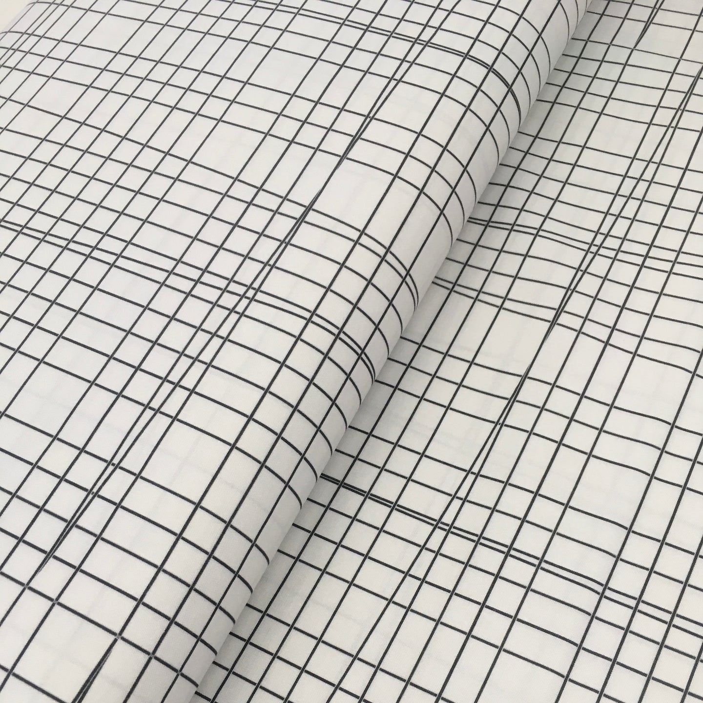 Road Trip Grid on White for Paintbrush Studio, sold by the half-yard