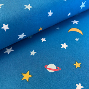 Galactic/ Glow-in-the-dark by Michael Miller Fabrics, sold by the half-yard