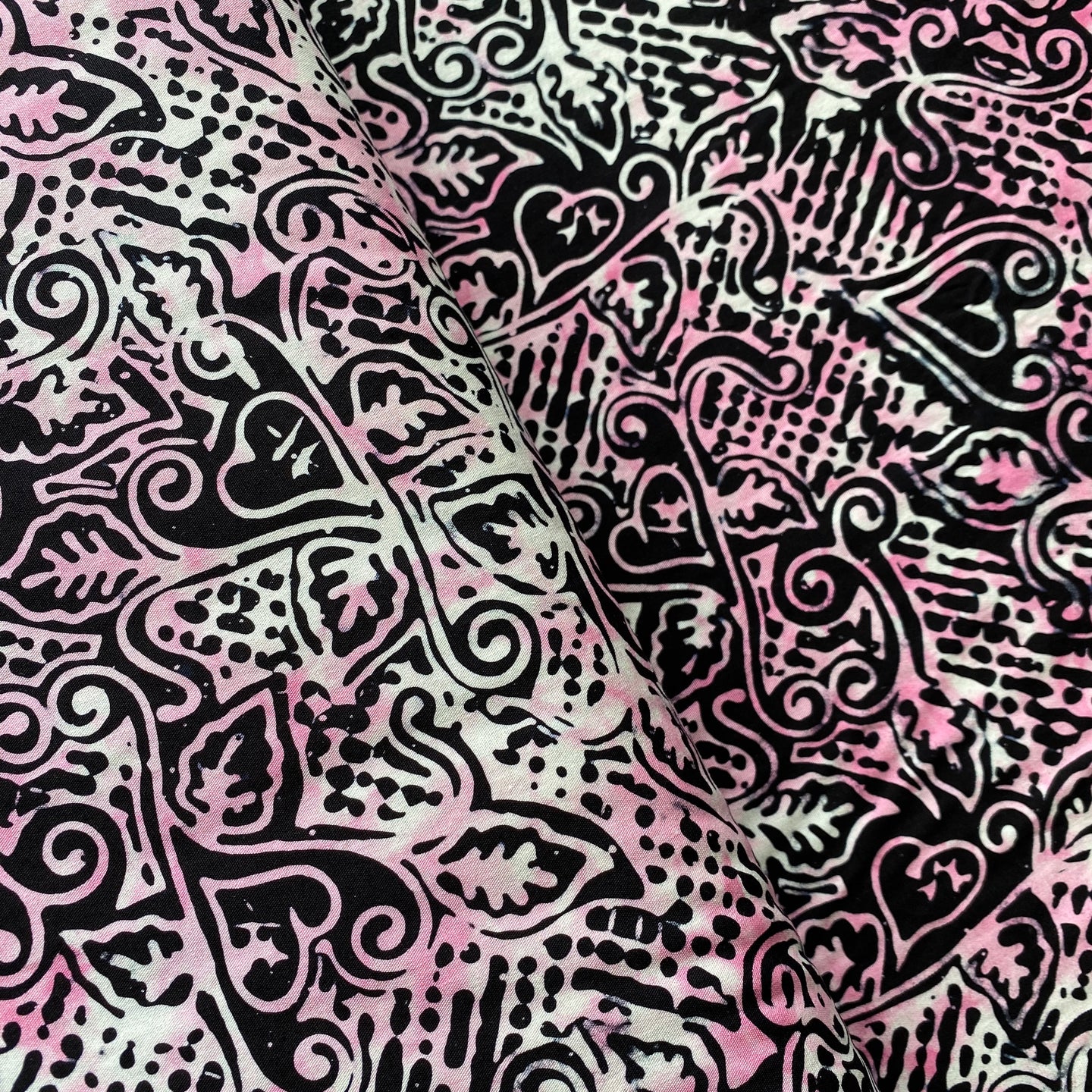 Black, Pink and White Hearts & Swirls Batik by Batik Textiles, sold by the half-yard