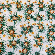 Pineapples and Flowers on Cream by Trans-Pacific Textiles, LTD, sold by the half-yard