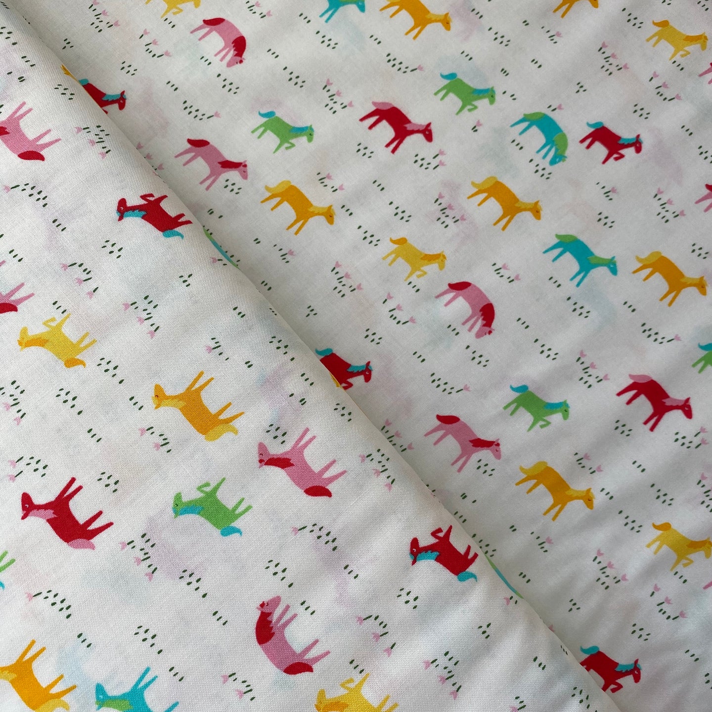 Rainbow Horses, Best Friends Forever, bu Stacy Iest Hsu for Moda, sold by the half-yard