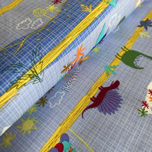 Load image into Gallery viewer, Dinosaur Park on Blue by Michael Miller Fabrics, sold by the half-yard
