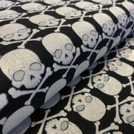 Gothic Glam Metallic Silver Skulls on Black, by Kanvas Studio, sold by the half-yard