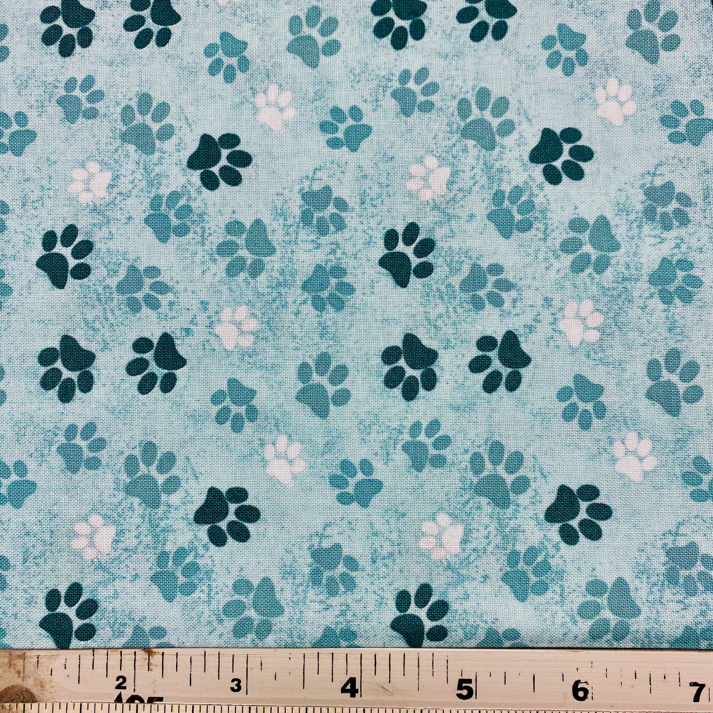 Paw Prints, Dog Wisdom on Light Teal by Wilmington Prints, sold by the half-yard