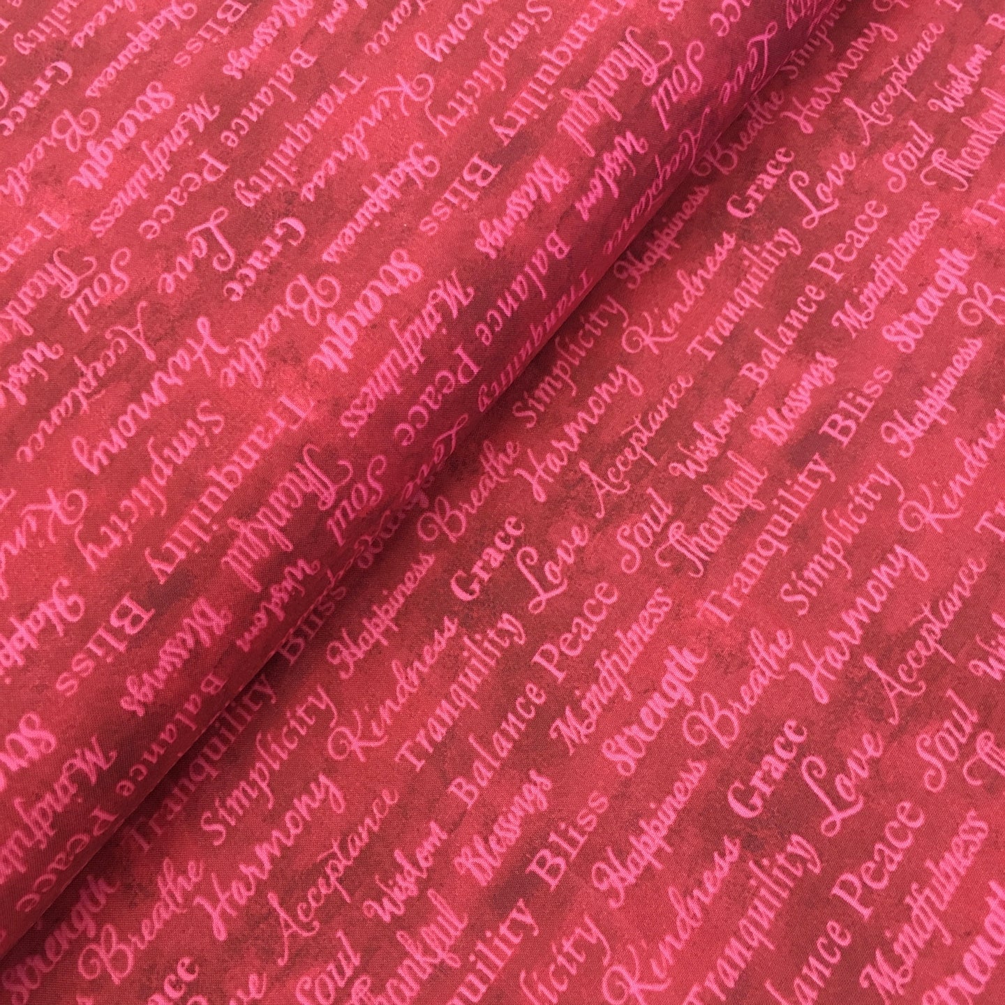Good Vibes Dark Red Text Y3121-83 by Clothworks, sold by the half-yard